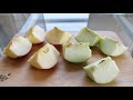 Cutting red and green apple