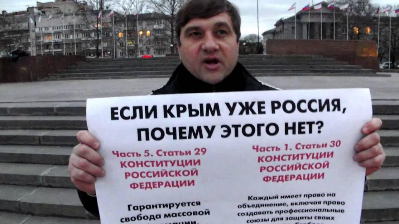 Суд в Алматы оштрафовал россиянина Тимофея Морозова за пикет в поддержку Украины