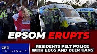Epsom ERUPTS: Police PELTED with eggs as FURIOUS residents demand truth on alleged 'sex attack'