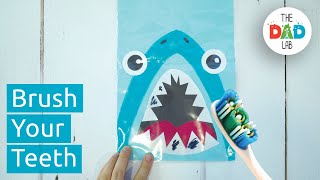 easy teeth brushing activity for kids with a shark