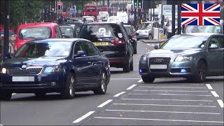 Convoy of unmarked police cars rush through the streets of London