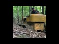 Fixing a washed out logging road with the Hd AC dozer.