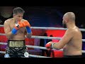 Полный бой с нокдауном казахстанского тяжеловеса и его победой над узбеком в бою за титулы WBC и WBA