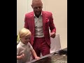 Conor Mcgregor and Jr signing posters on fight island Abu Dhabi for UFC 257