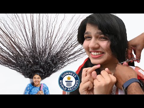 Cutting the world's LONGEST HAIR - Guinness World Records