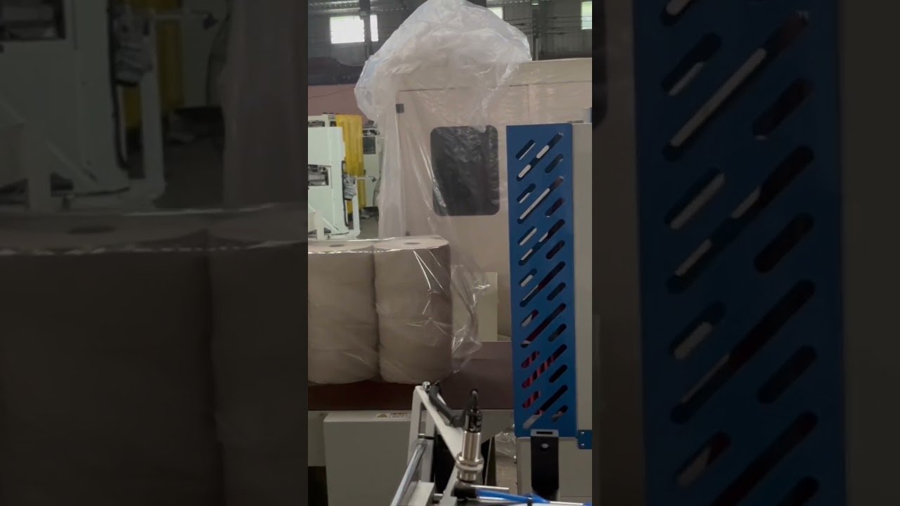 Bobbin paper maxi roll packing machine 