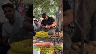 Preparing what appears to be potatoes