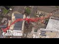 Crane collapses into building in east London