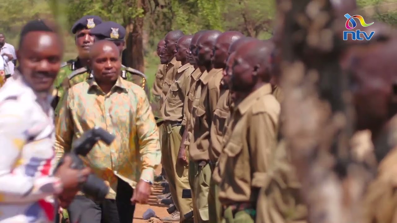 CS Kindiki inspects the guard of honour during the NPR recruits gradation