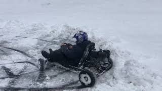 Manco American Express go kart in snow. Madness!