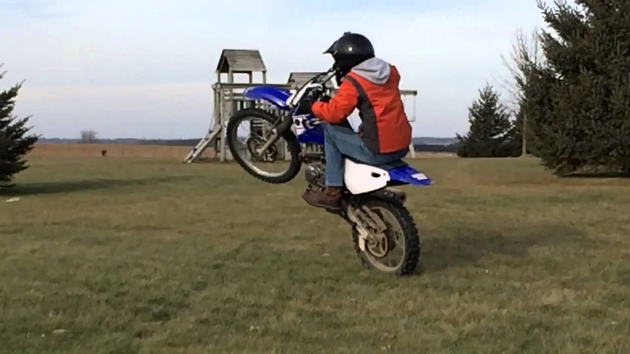 Dirt bike wheelies - YouTube