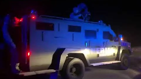 Scene outside Pitts Road standoff for Daniel Miner