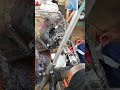 WITH LINE BORING MACHINE SMOOTHENING ROUGH EDGES IN EXCAVATOR'S DIPPER STICK