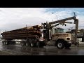 B.C. LOGGING TRUCKS #21 - Wet dirt & grime cover trucks hauling down city highways and byways!