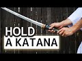 How to hold a katana