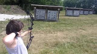 Sarah shooting at a bottle stuck into the target block.. screenshot 4