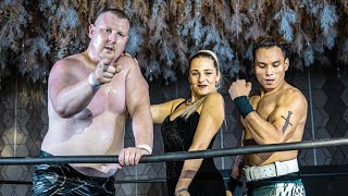 The Regnant Stable's (Big Sam, Ash Silva, and Lady Marie) entrance for MKW Blast-Off episode 24