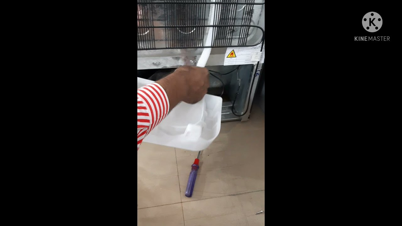 how to clean fridge water tray how to remove haier fridge drain tray