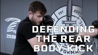 How to defend a rear body kick! Complete guide to evading, blocking, catching and attacking from it