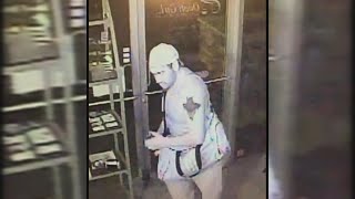 Hair salon surveillance captures burglar with distinct tattoos