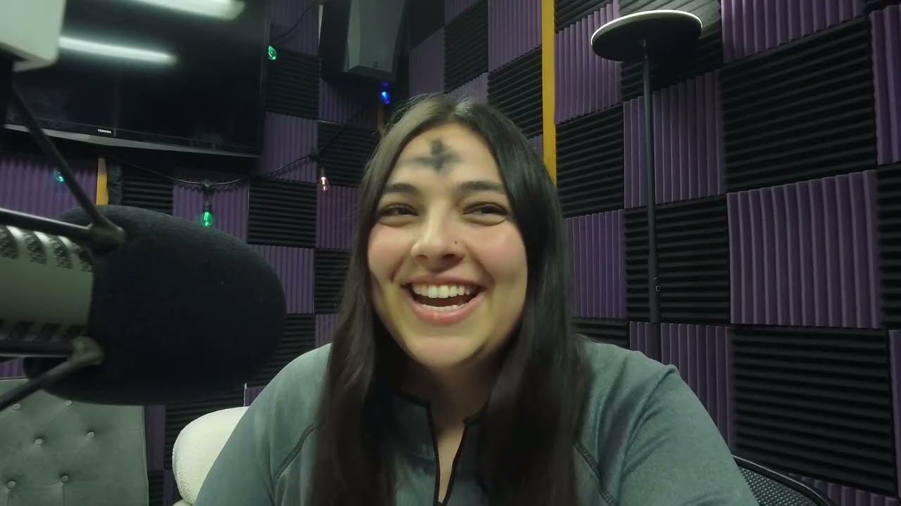 Katie Zachgo smiles in the Wildcat 91.9 On-Air Studio.