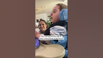 Child with Rett syndrome uses AAC device with eye gaze