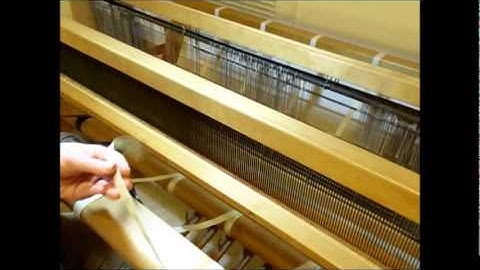 How to Weave on a Loom - Video 7 - Sleying a reed on a loom Part 1