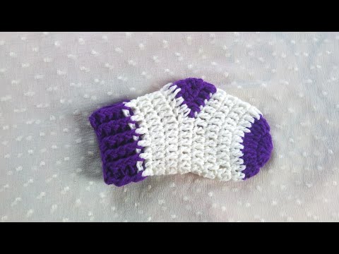 ভিডিও: কিভাবে মোজা Crochet