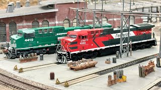 ScaleTrains Ferromex ES44AC & Ferrosur AC4400CW locomotives with a mixed freight train at AEWRR