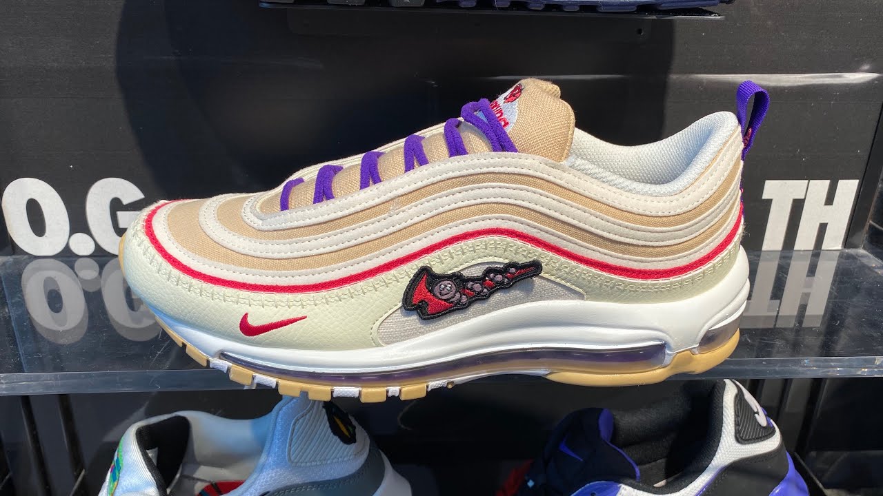 purple and gold air max 97