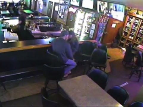 Raw: Couple Kisses Through Montana Bar Robbery