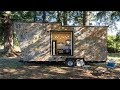Luxury tiny house with a real rock climbing wall on its exterior