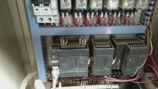 PLC system troubleshooting and repair. Industrial control panel. PLC system repair. Step7 S7 plc