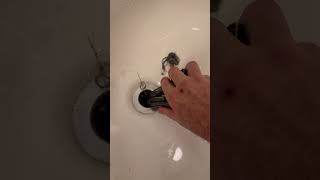 Unclogging a bath tub drain  #plumbing