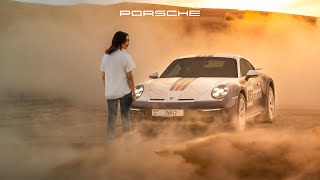 Dashing across the dunes in a Porsche 911 Dakar