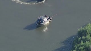 LIVE | Search for missing person in water after boat capsizes
