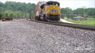 A UP GEVO Leads A Stack Train Pushed by an ACe