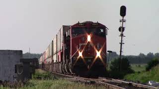 VIA Rail Train 26 Meets a Long Stack Train CN 121 at Sainte Perpetue, Quebec