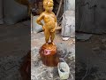 Completely finished kid peeing statue