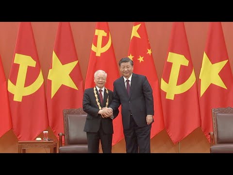 Xi presents china's friendship medal to vietnam's communist party chief nguyen phu trong