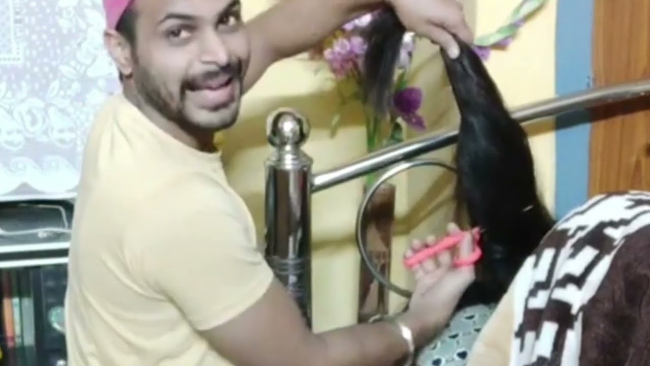 cutting girlfriend hair while sleeping