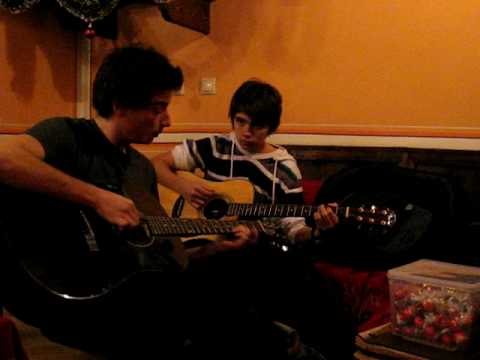 Dobrian Dobrev and Vito Greco playing guitars