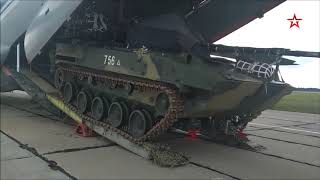 Russian light tanks BMD-4M loaded an dropped from an Il-76MD