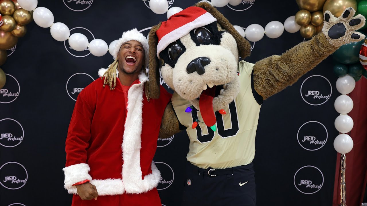 Игроки команды «Нью-Орлеан Сэйнтс» дарят праздничное настроение в рамках акции «Месяц благотворит...