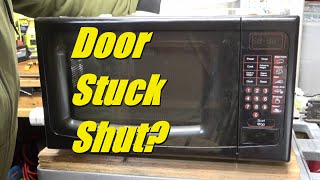 How to open a microwave door stuck shut, door won&#39;t release, button doesn&#39;t work