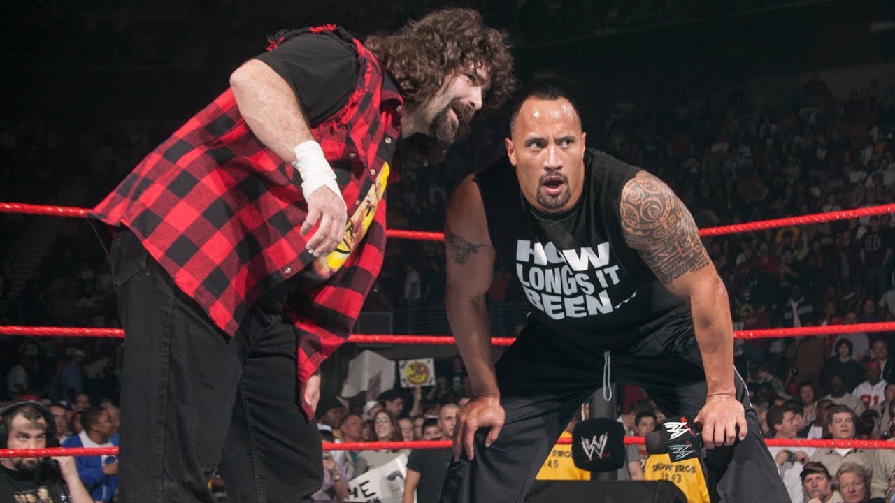 The Rock returns to help Mick Foley against Evolution: Raw, March 1, 2004