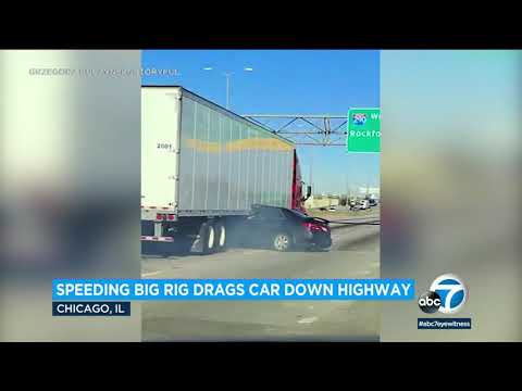 Video: Big rig drags car down highway with driver pinned underneath trailer l ABC7