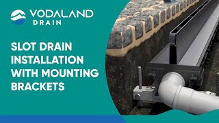 Vodaland - Slot-Drain installation with mounting brackets