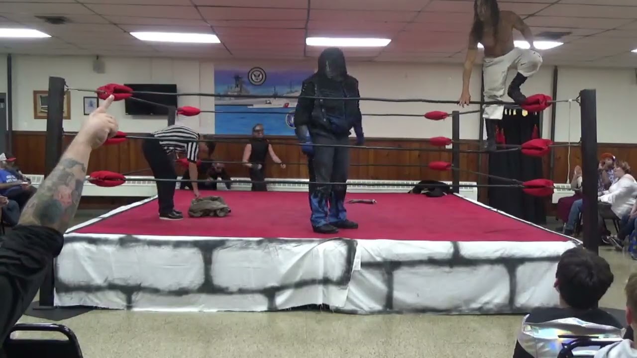 Samael Harris and Wyatt Ravage vs. Payne's Mystery Wrestlers