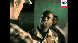 Rebel leader says he has no agenda beyond deposing Aristide Profile